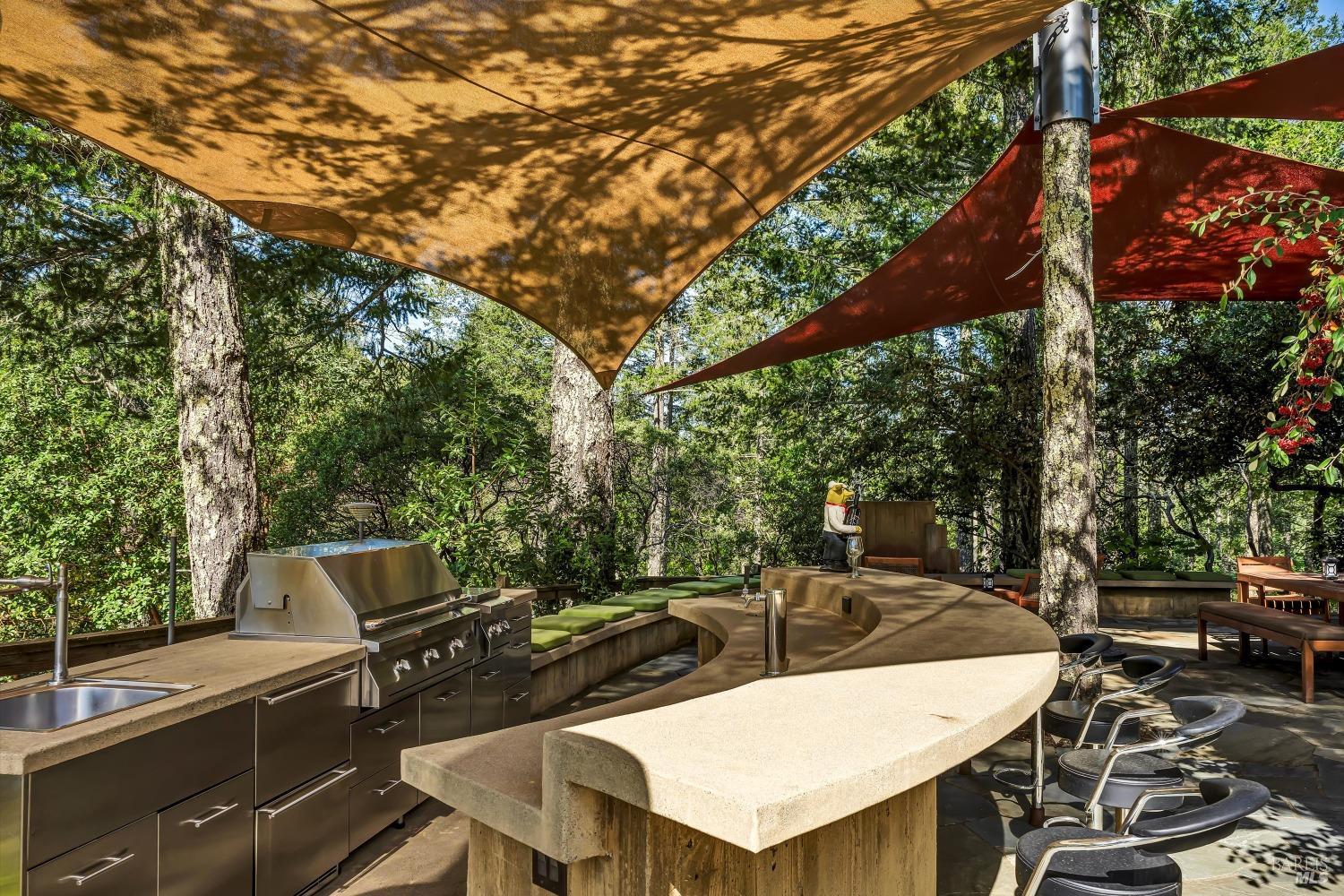 511 Kortum Canyon Road Calistoga, CA 94515 - Photo 57 of 87 Outdoor kitchen with bar seating.