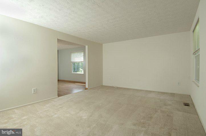 5742 Heming Avenue Springfield, VA 22151 - Photo 22 of 28 a view of an empty room with window and closet area