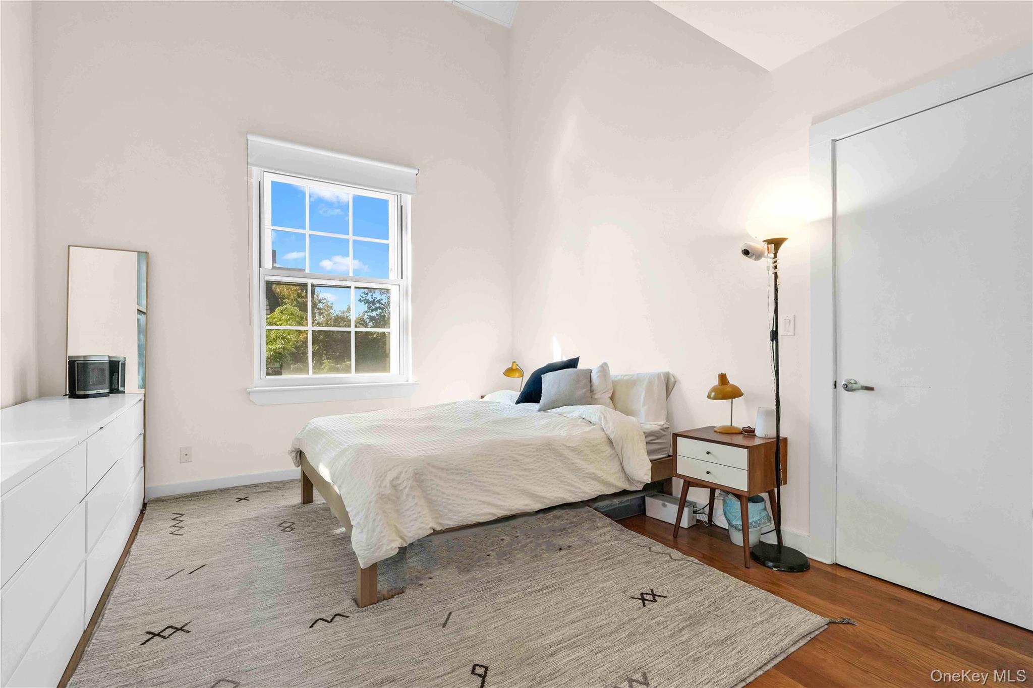 401 Hicks Street, Unit 5B Brooklyn, NY 11201 - Photo 11 of 28 a bed room with a bed and a window
