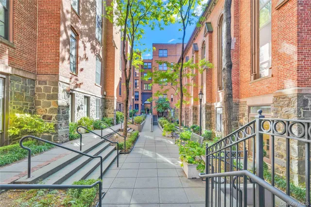 a view of balcony with furniture