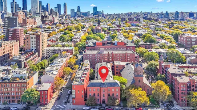 a view of a city with tall buildings