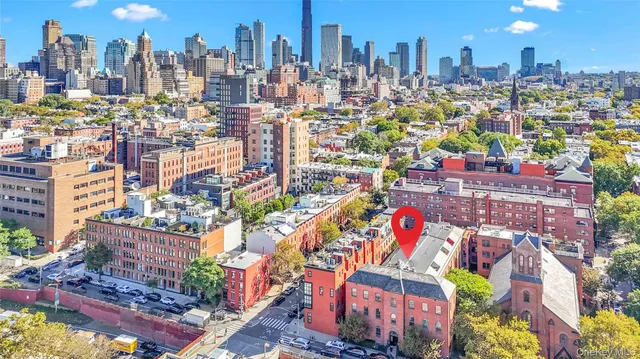 a view of a city with tall buildings