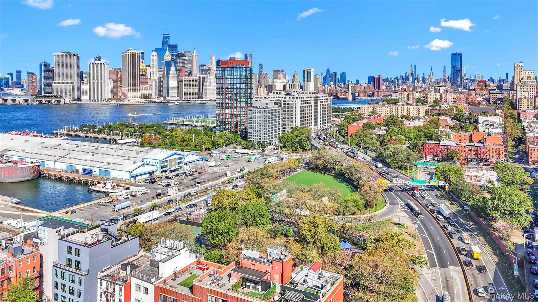 401 Hicks Street, Unit 5B Brooklyn, NY 11201 - Photo 25 of 28 a view of a city with tall buildings