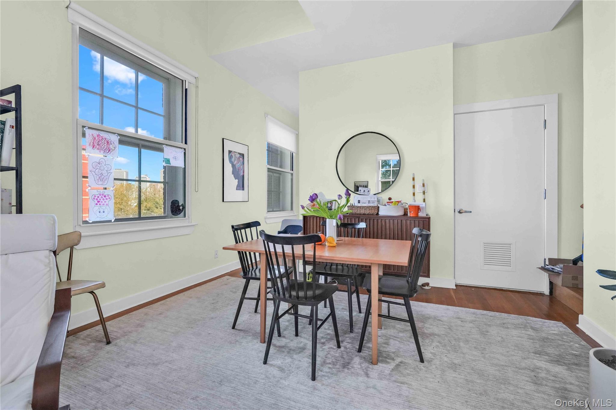 401 Hicks Street, Unit 5B Brooklyn, NY 11201 - Photo 7 of 28 a view of a dining room with furniture and a window