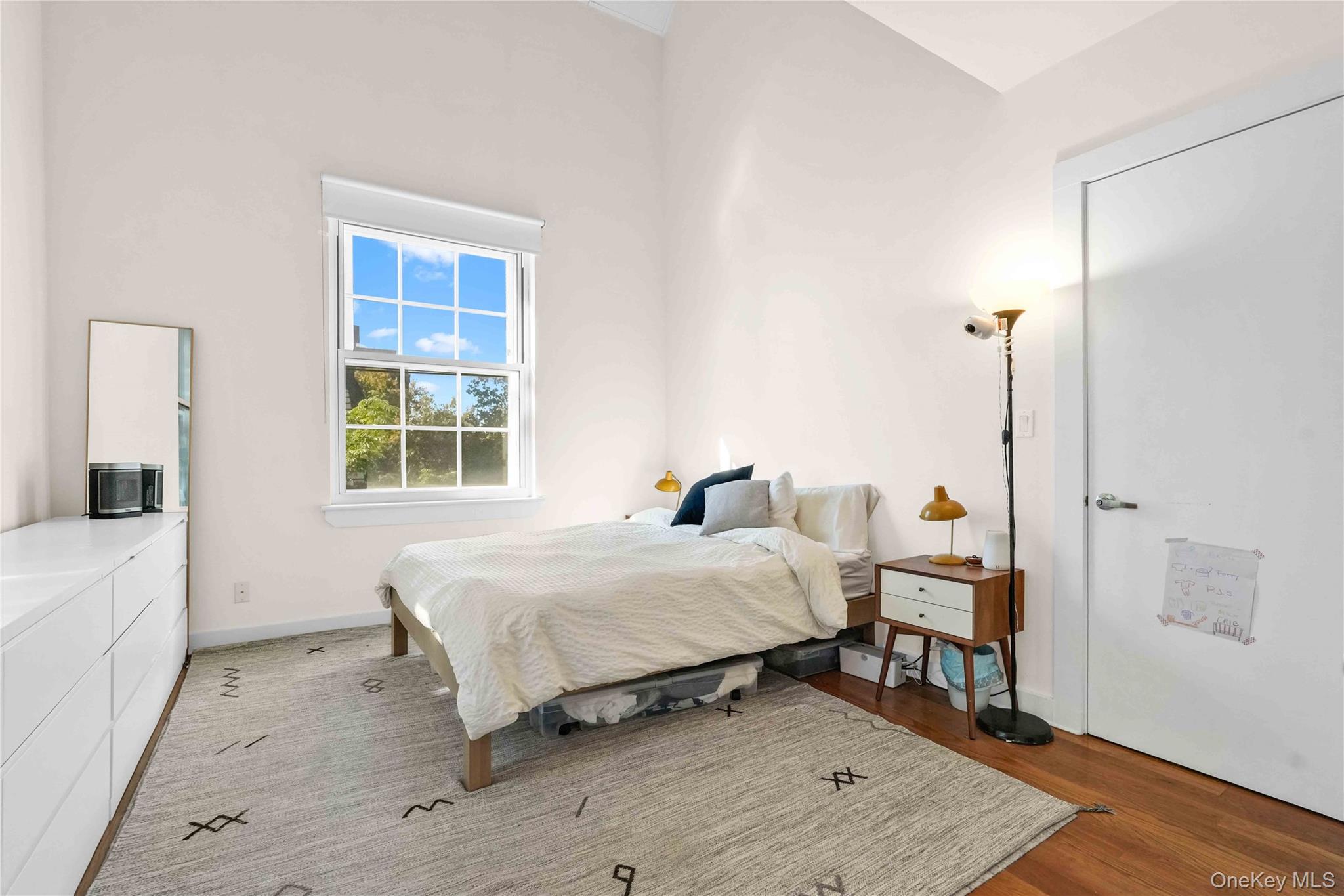 401 Hicks Street, Unit 5B Brooklyn, NY 11201 - Photo 8 of 28 a bed room with a bed and a window