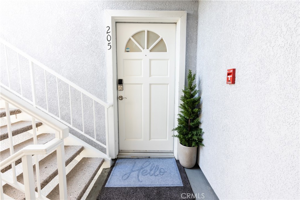 a view of entryway with wooden floor