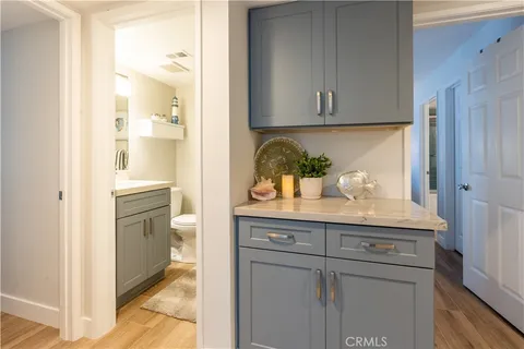 a bathroom with a sink a toilet and vanity