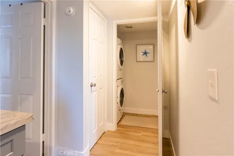 a bathroom with a sink toilet and mirror