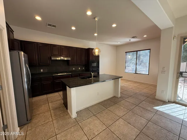 a bathroom with a sink and a vanity