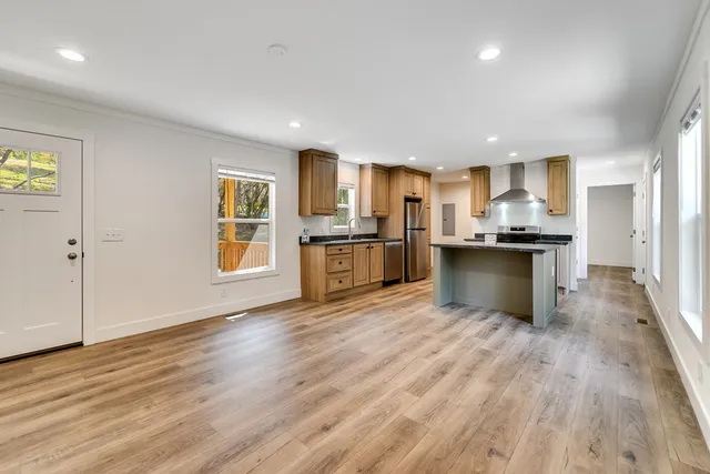 a view of kitchen with wooden floor