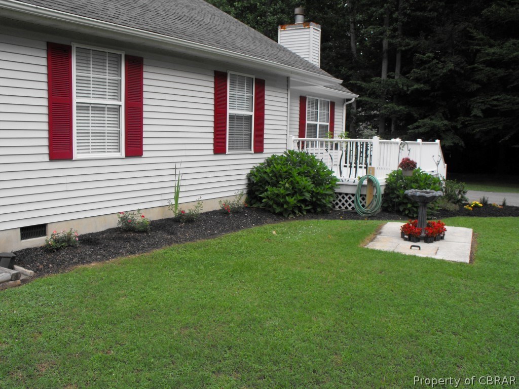 207 Windsor Road Dutton, VA 23050 - Photo 37 of 38 a house view with a garden space
