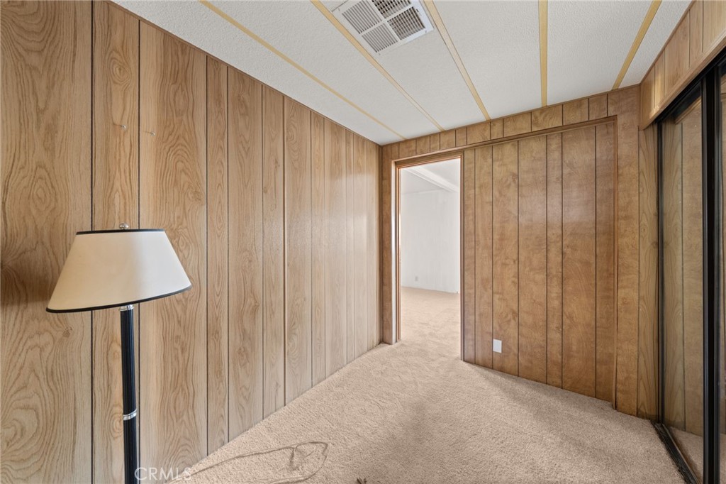 1255 Amethyst Street, Unit 32 Mentone, CA 92359 - Photo 15 of 32 a very nice looking room with a large window