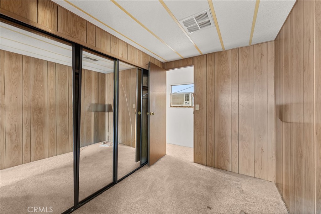 1255 Amethyst Street, Unit 32 Mentone, CA 92359 - Photo 16 of 32 a view of a hallway