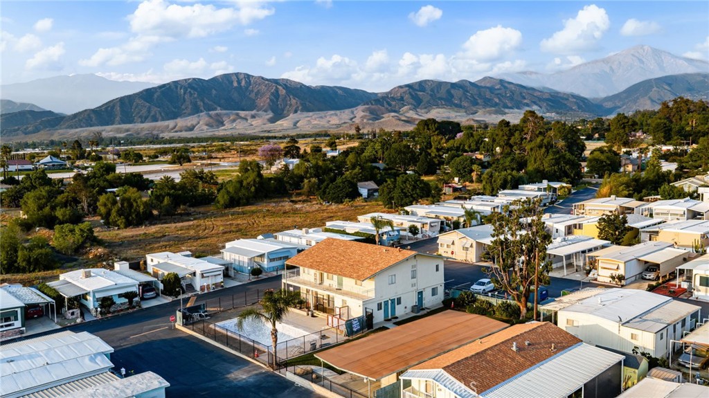 1255 Amethyst Street, Unit 32 Mentone, CA 92359 - Photo 21 of 32 a view of a city with mountains in the background