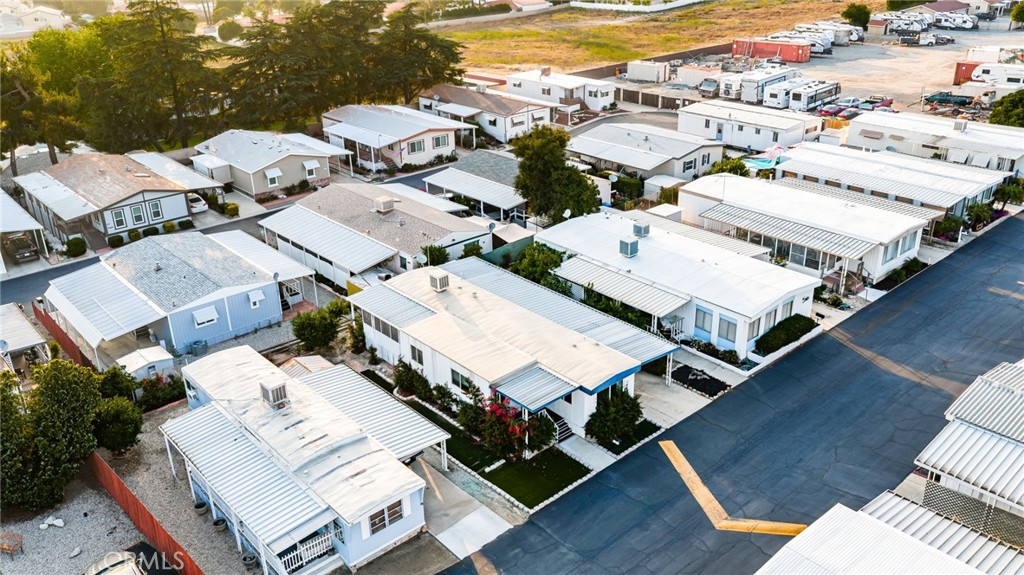 1255 Amethyst Street, Unit 32 Mentone, CA 92359 - Photo 25 of 32 an aerial view of a residential houses with outdoor space
