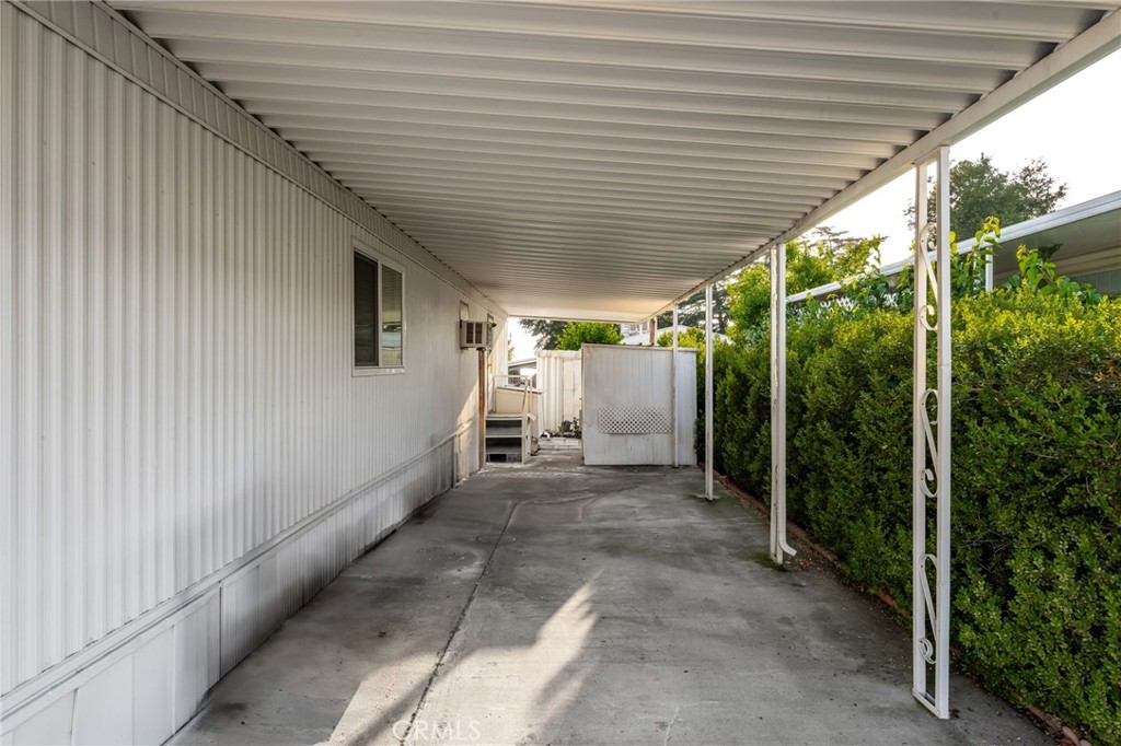 1255 Amethyst Street, Unit 32 Mentone, CA 92359 - Photo 28 of 32 a view of a porch