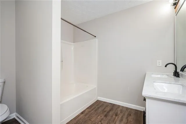 a bathroom with a sink and a vanity