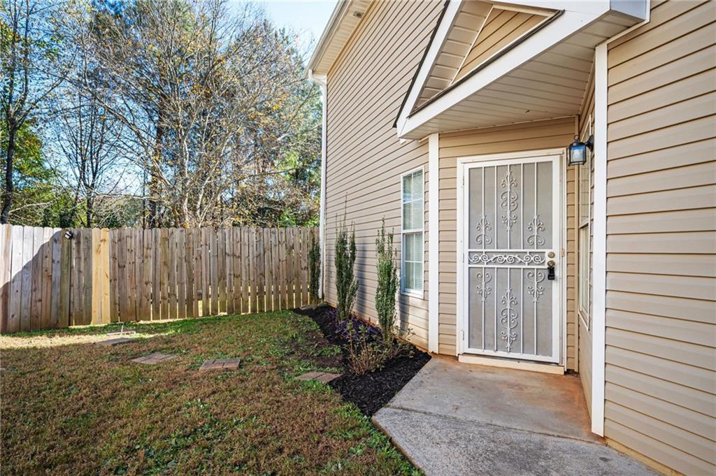 3375 River Run Trail Decatur, GA 30034 - Photo 2 of 27 a view of a backyard with wooden fence