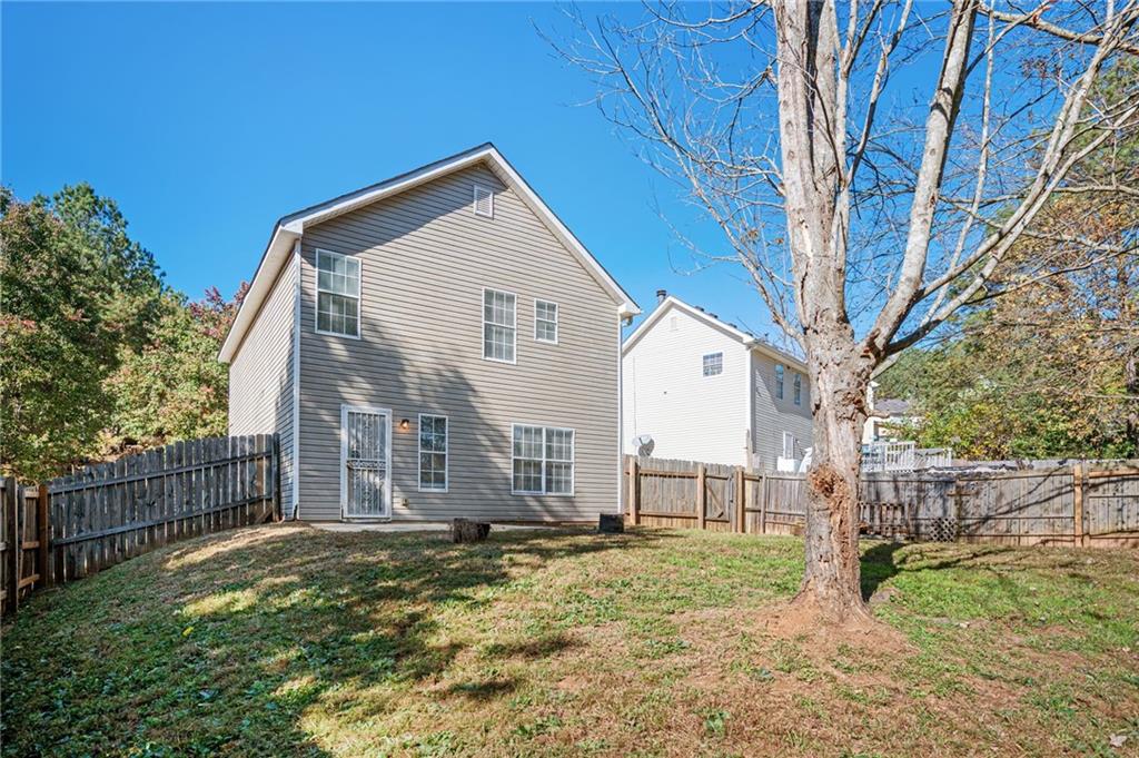 3375 River Run Trail Decatur, GA 30034 - Photo 25 of 27 a view of a house with backyard and trees