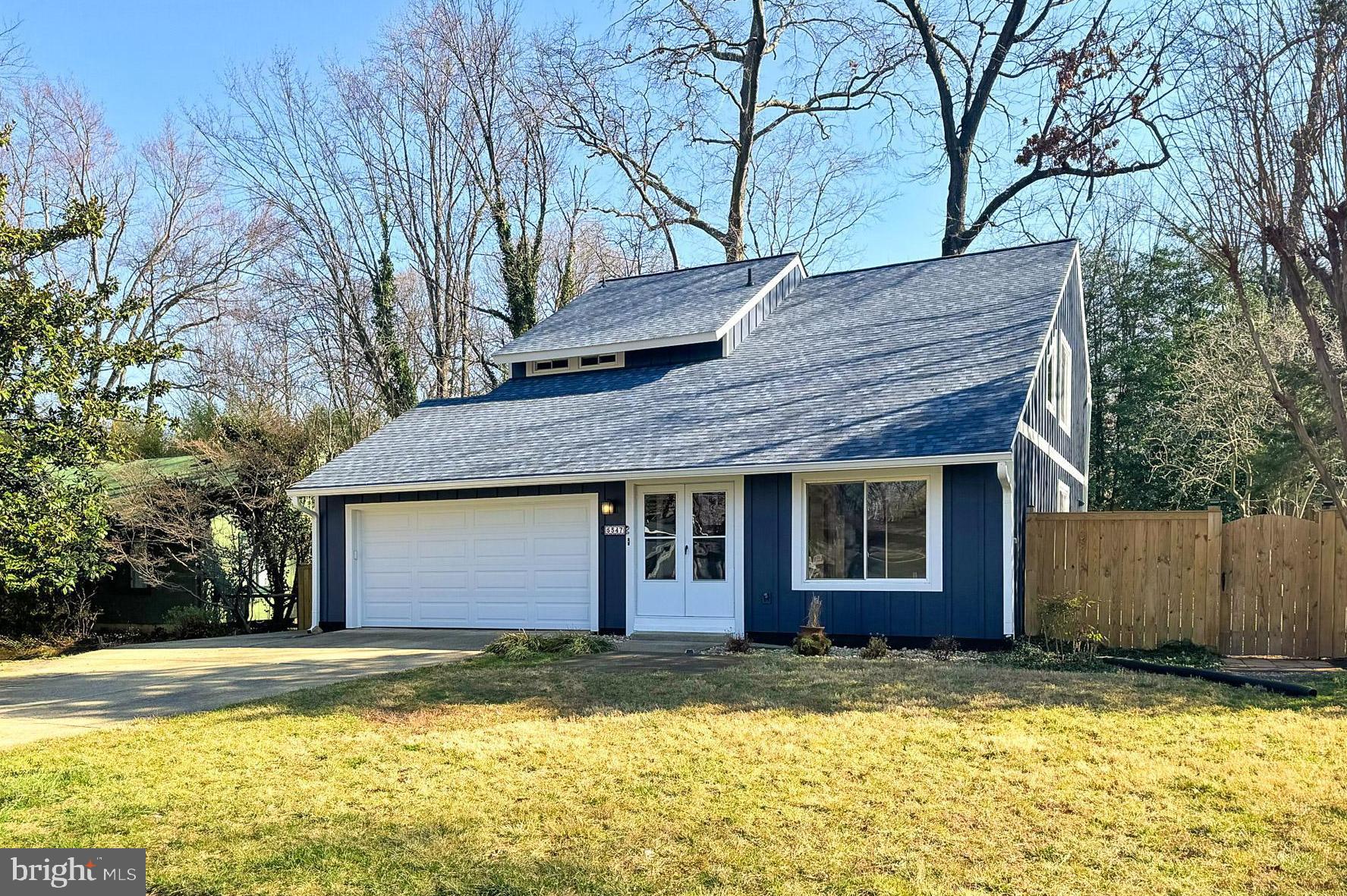 New Hardie Panel Vertical Siding;  New Garage Door