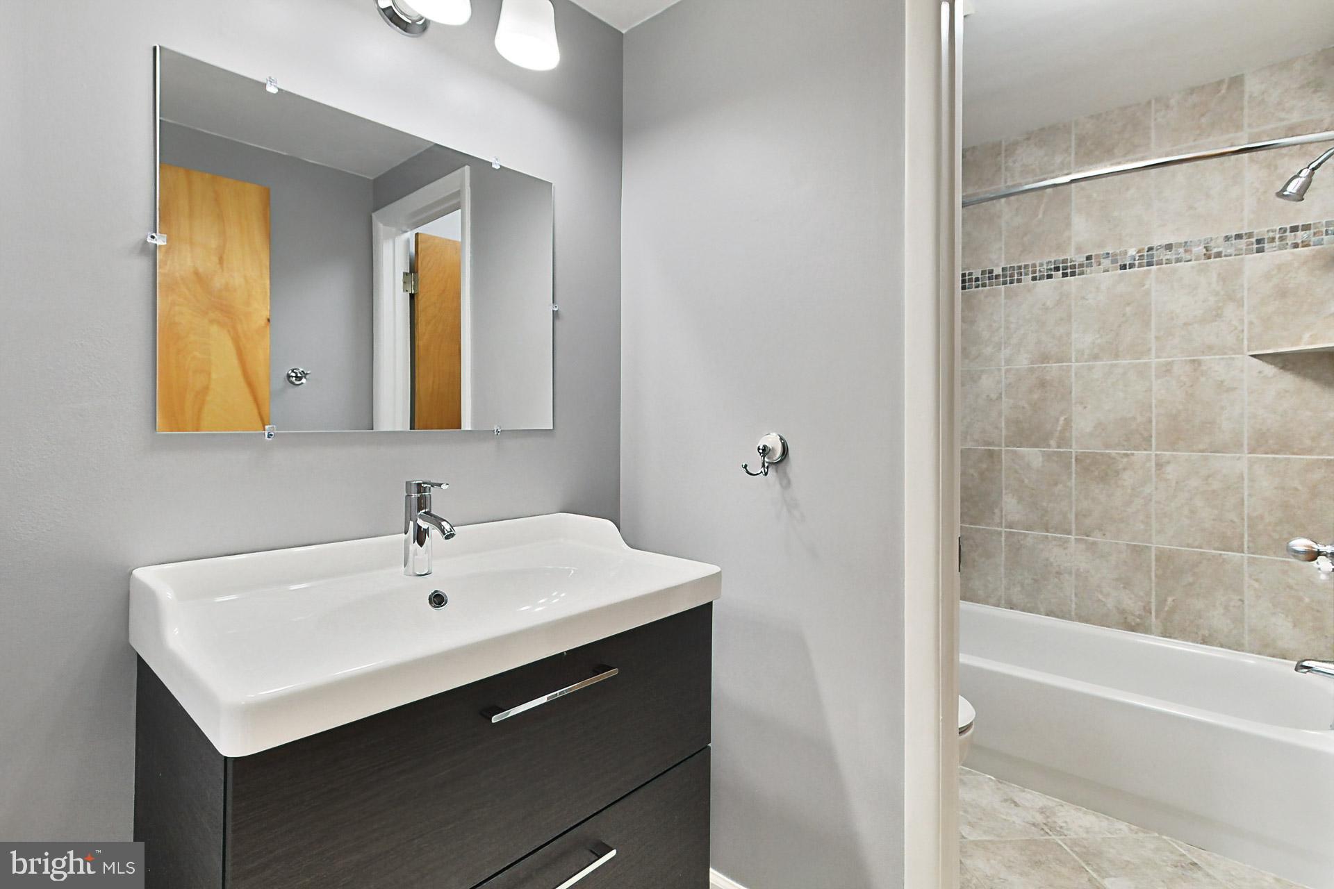 5347 Aylor Road Fairfax, VA 22032 - Photo 18 of 61 Renovated Upstairs Hall Bath