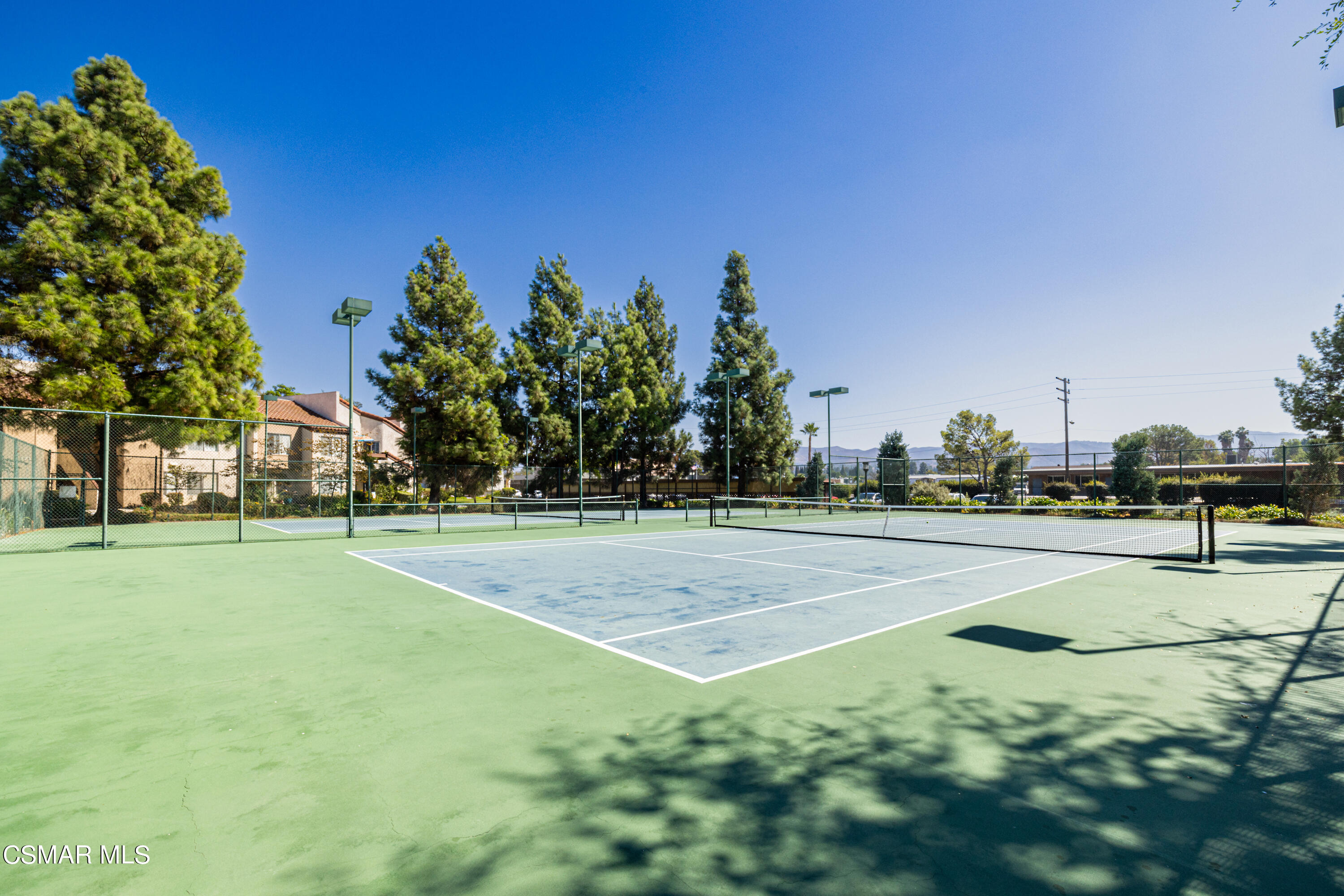 1736 Sinaloa Road, Unit 313 Simi Valley, CA 93065 - Photo 23 of 27 a view of an outdoor space and tennis court