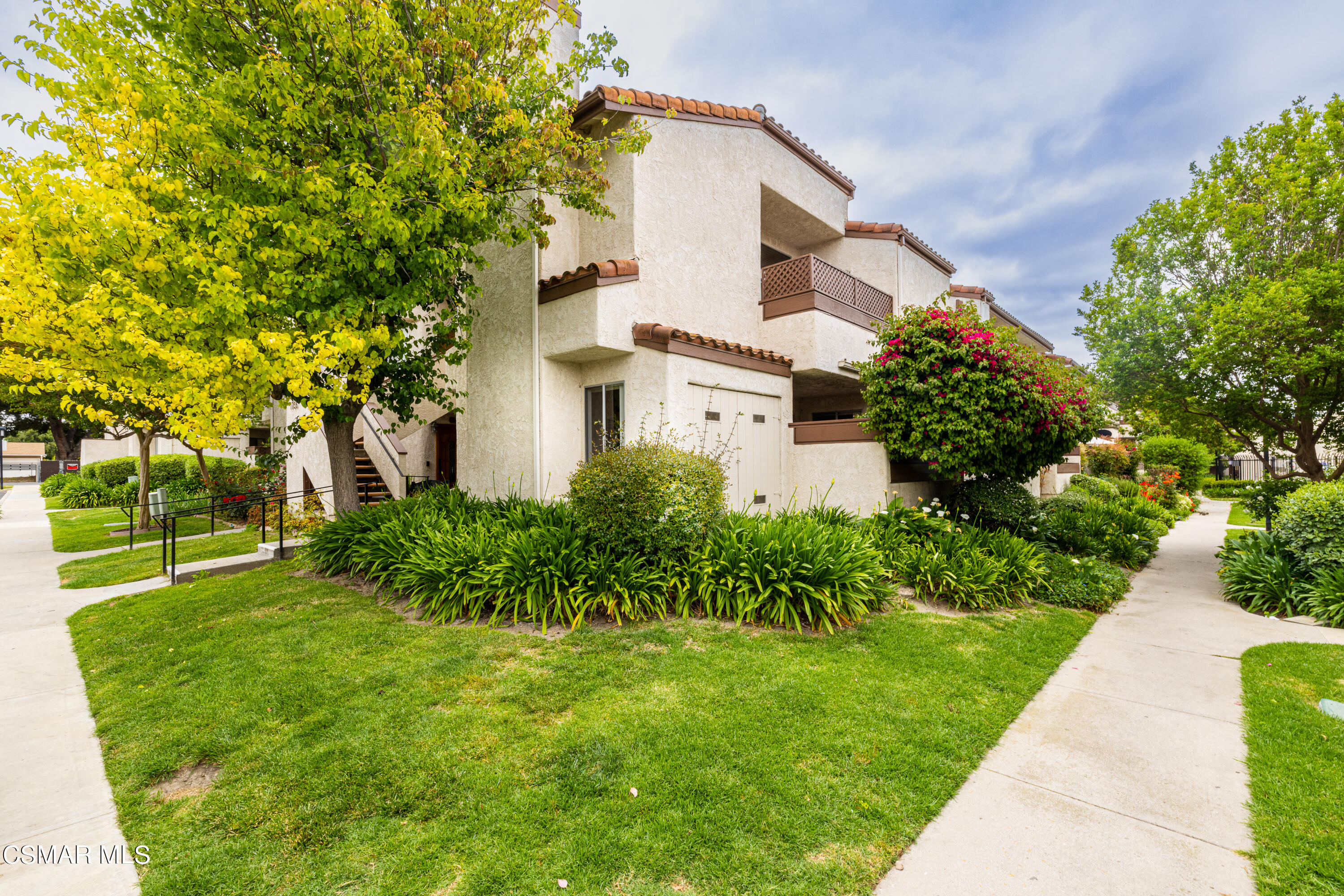 1736 Sinaloa Road, Unit 313 Simi Valley, CA 93065 - Photo 27 of 27 a front view of a house with a yard
