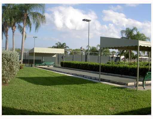 18999 Stewart Circle, Unit 3 Boca Raton, FL 33496 - Photo 14 of 14 a view of a park with a palm tree