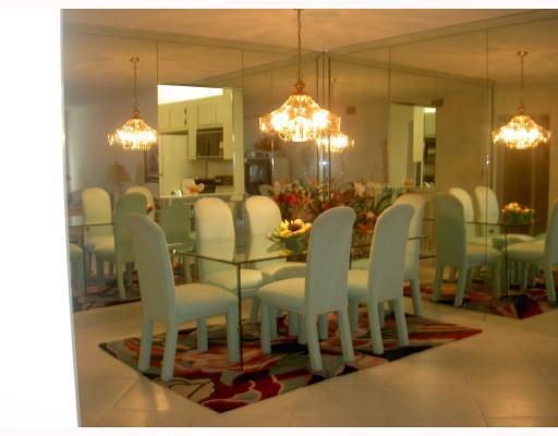 18999 Stewart Circle, Unit 3 Boca Raton, FL 33496 - Photo 3 of 14 a bathroom with a mirror