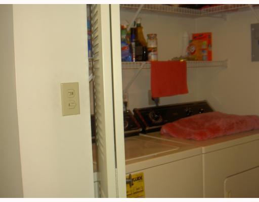 18999 Stewart Circle, Unit 3 Boca Raton, FL 33496 - Photo 8 of 14 a bathroom with a sink and a mirror