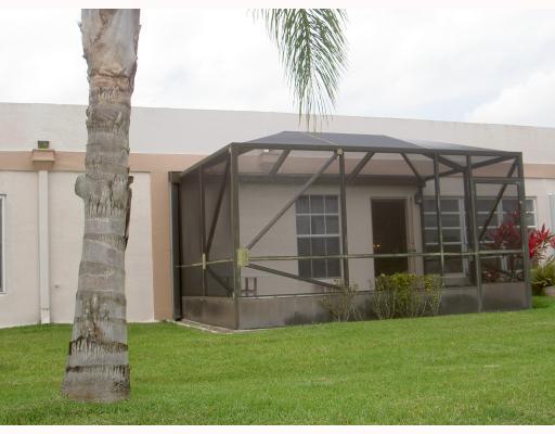 18999 Stewart Circle, Unit 3 Boca Raton, FL 33496 - Photo 9 of 14 a view of a backyard with plants