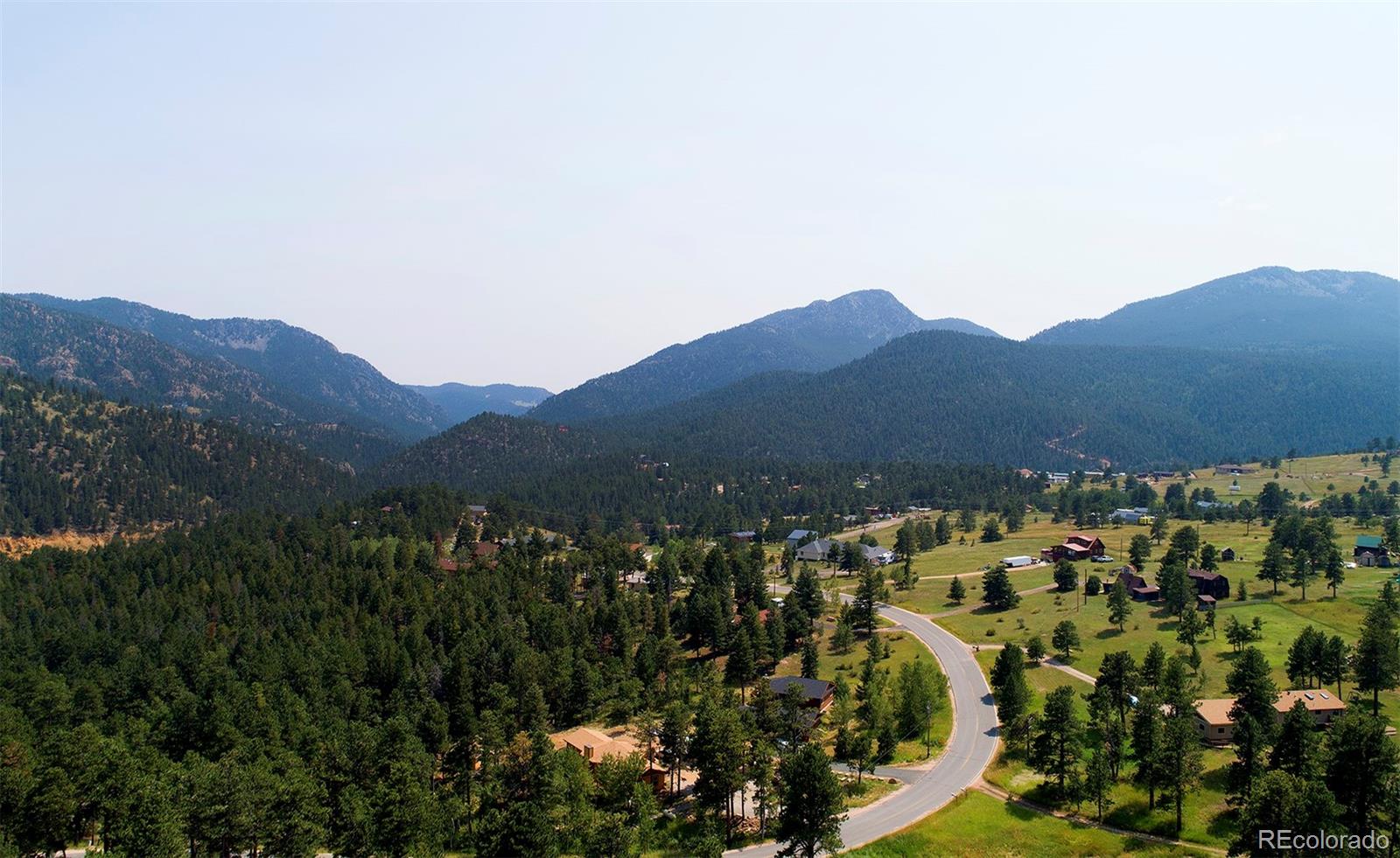11655 Ranch Elsie Road Golden, CO 80403 - Photo 10 of 36 a view of a town with mountains in the background