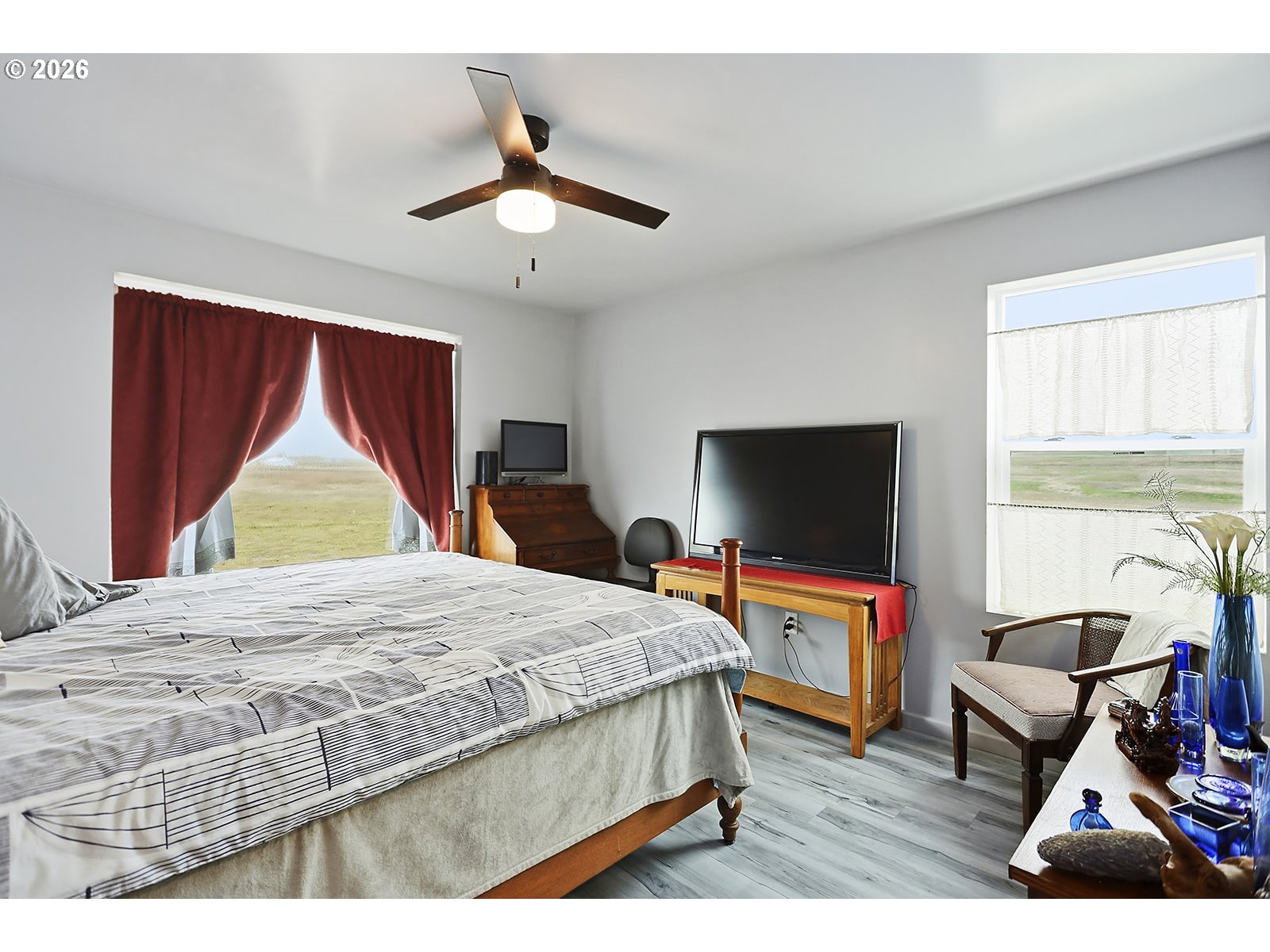 15 Levin Lane Goldendale, WA 98620 - Photo 21 of 47 a bedroom with a bed and a flat screen tv