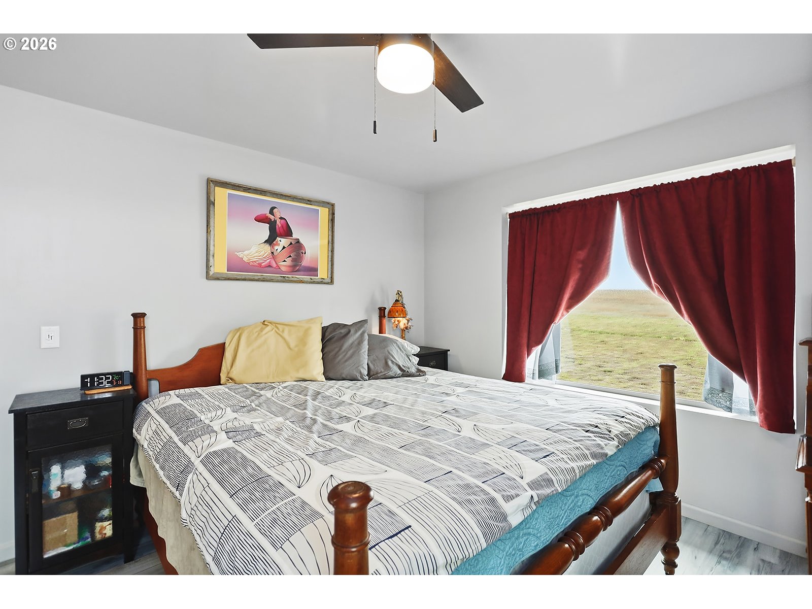 15 Levin Lane Goldendale, WA 98620 - Photo 22 of 47 a bed sitting in a bedroom next to a window