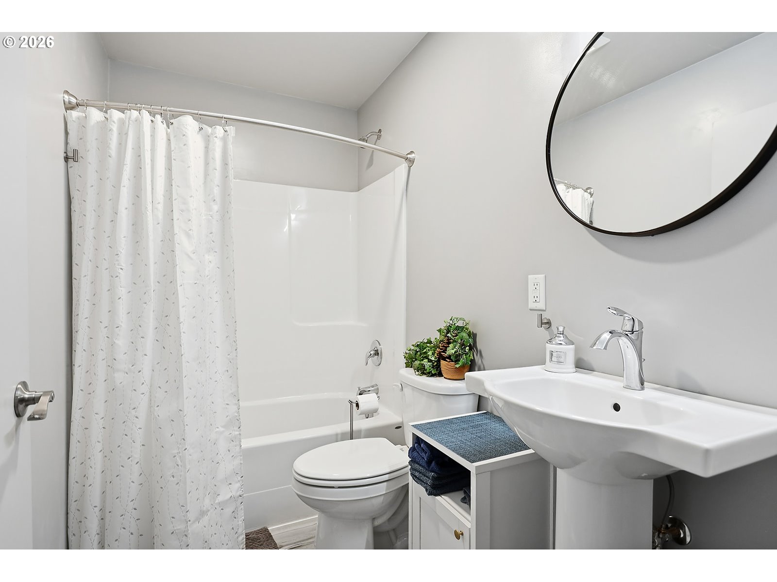 15 Levin Lane Goldendale, WA 98620 - Photo 30 of 47 a bathroom with a sink a toilet and a mirror