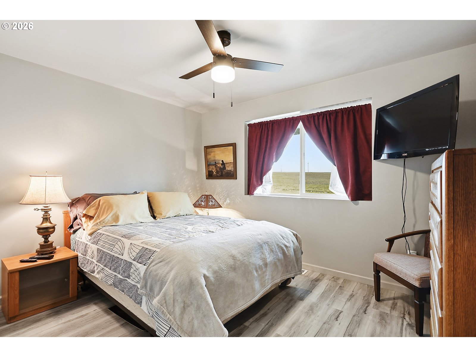 15 Levin Lane Goldendale, WA 98620 - Photo 33 of 47 a bedroom with a bed and a flat screen tv