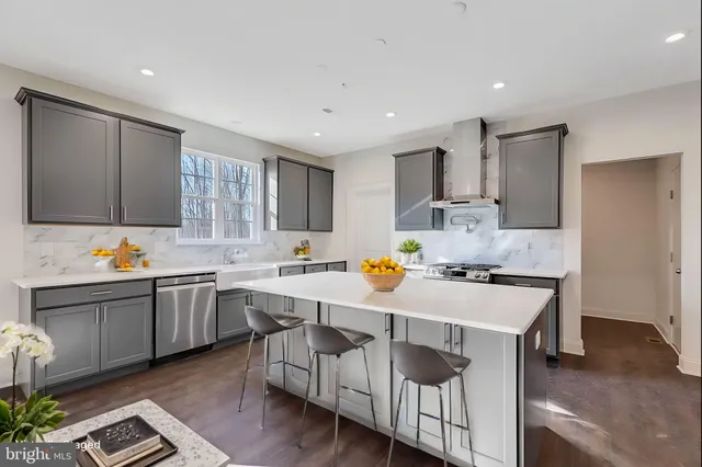 a kitchen filled counter top space cabinets and appliances