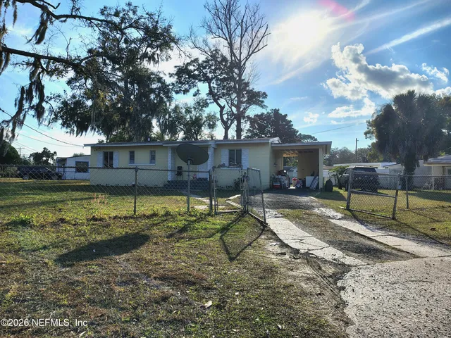 a house view with a garden space