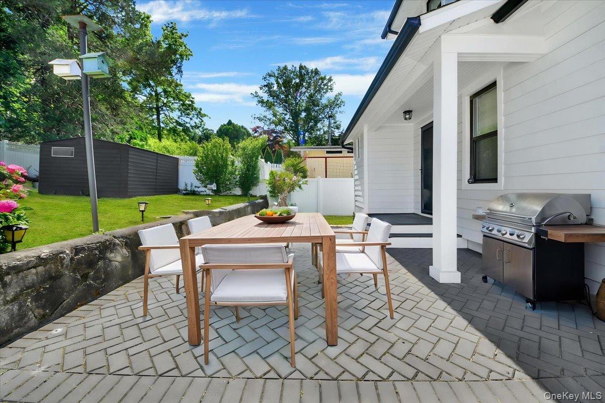 925 Reynolds Street Peekskill, NY 10566 - Photo 34 of 42 Backyard - New Stone Patio- Virtually Staged