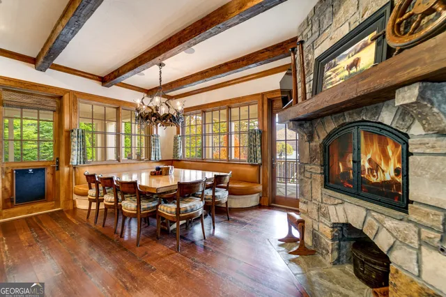 a bedroom with a large bed and a large window