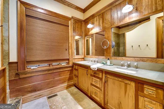 a room with furniture and large windows