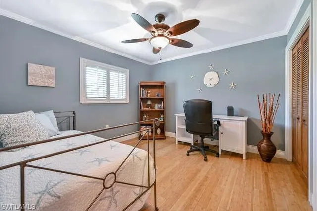 a workspace with furniture and a window