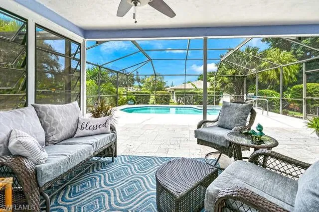 a outdoor living space with furniture and garden view