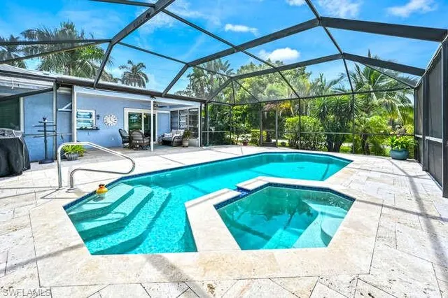 a view of a patio with swimming pool