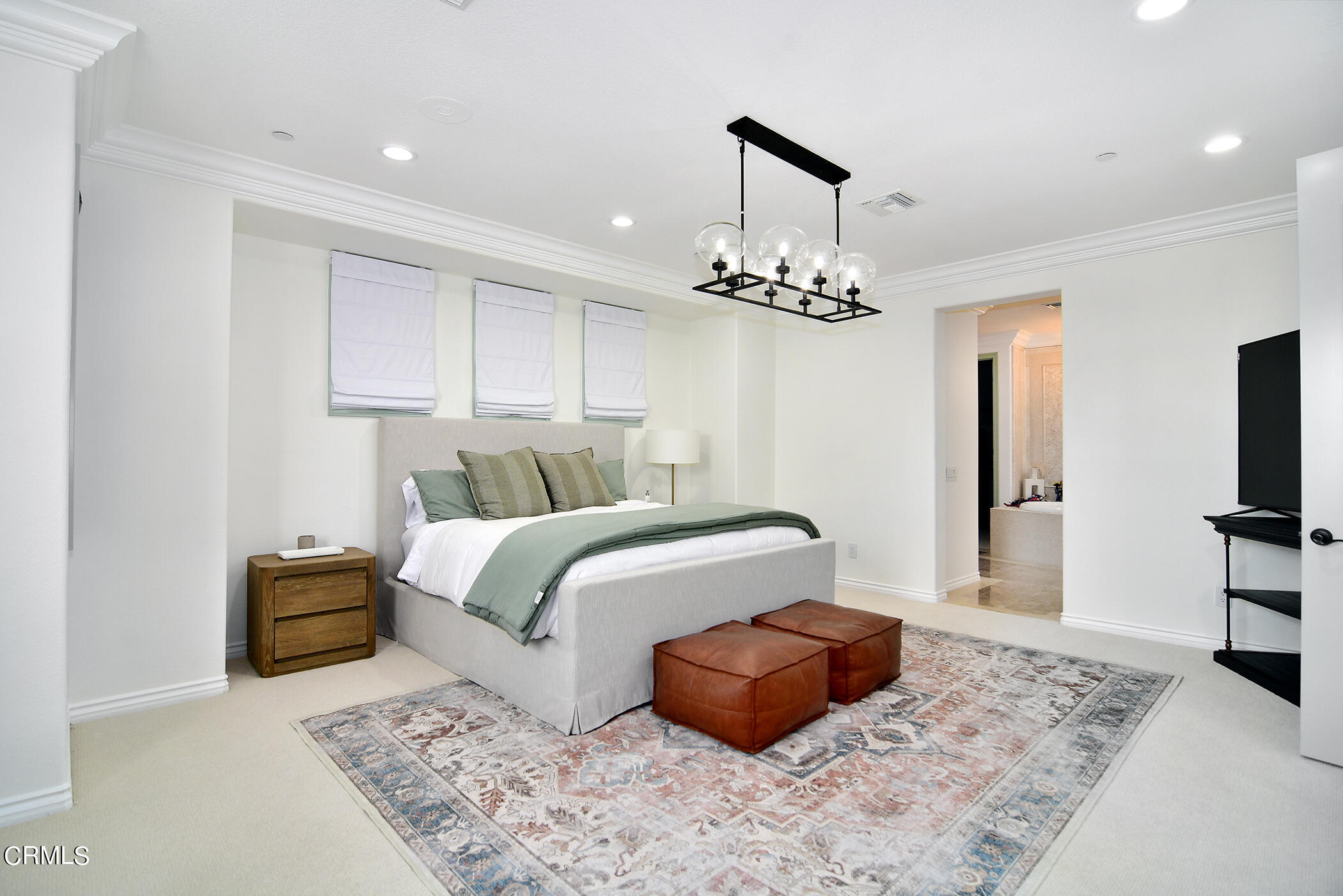 4011 Adriatic Street Oxnard, CA 93035 - Photo 16 of 31 a bedroom with a bed and a television