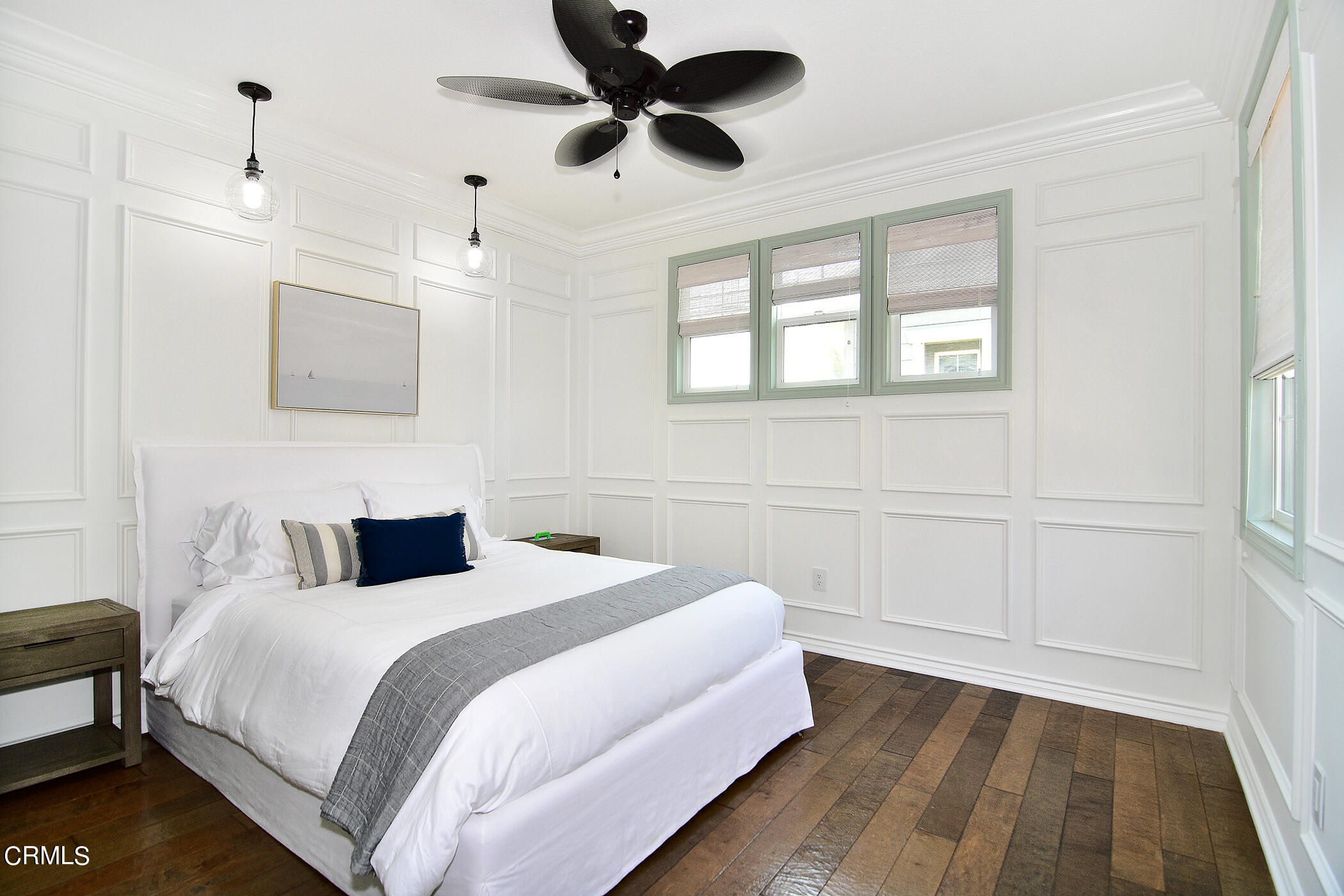 4011 Adriatic Street Oxnard, CA 93035 - Photo 18 of 31 a bedroom with a bed and a chandelier