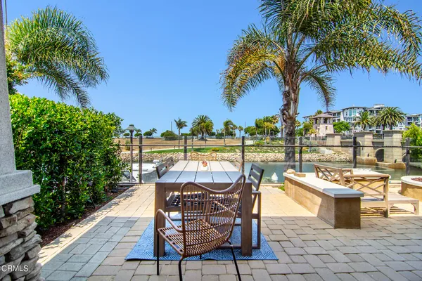 a view of a patio with swimming pool