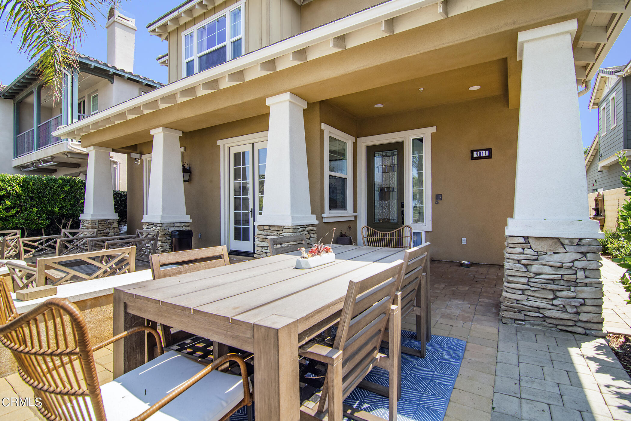 4011 Adriatic Street Oxnard, CA 93035 - Photo 25 of 31 a view of a patio with table and chairs