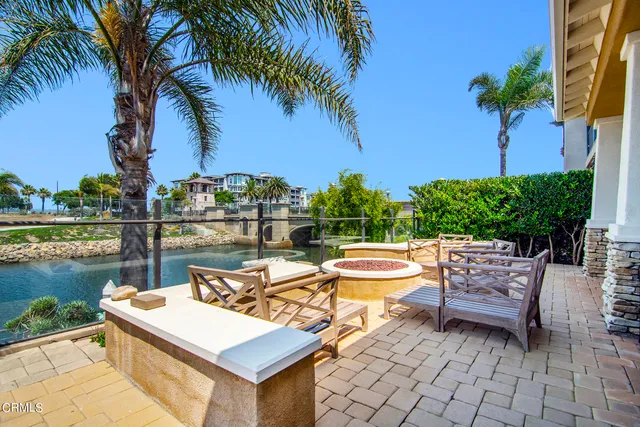 a view of a patio with two chairs and a table