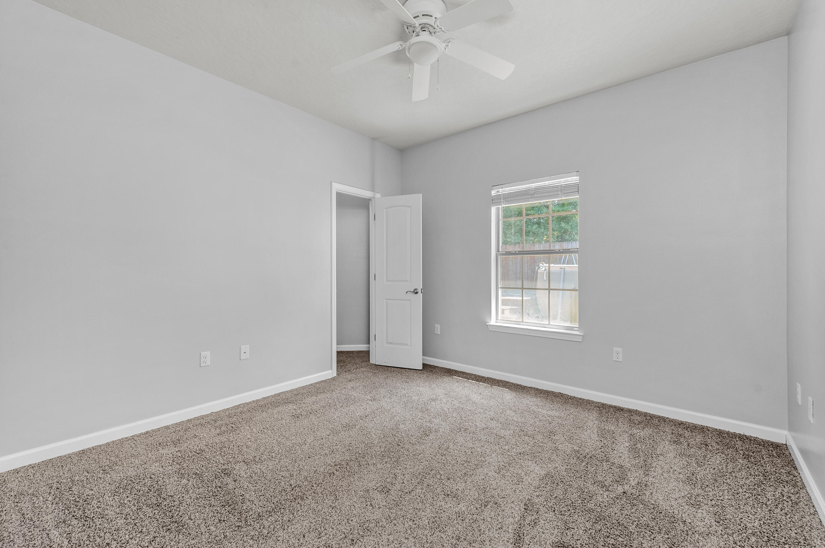 4586 Hermosa Road Crestview, FL 32539 - Photo 21 of 26 a view of an empty room with a window